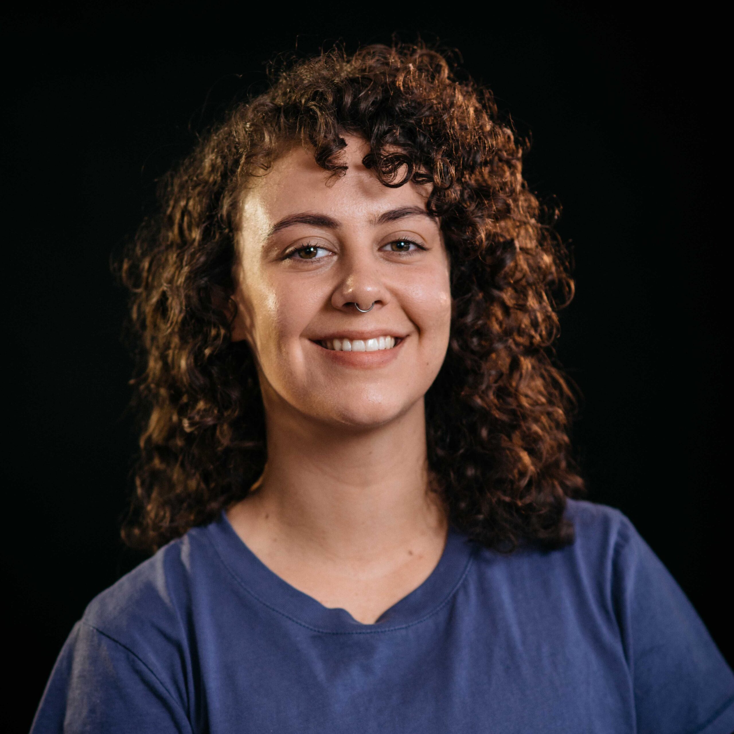 A headshot of Miriam Slater, smiling.