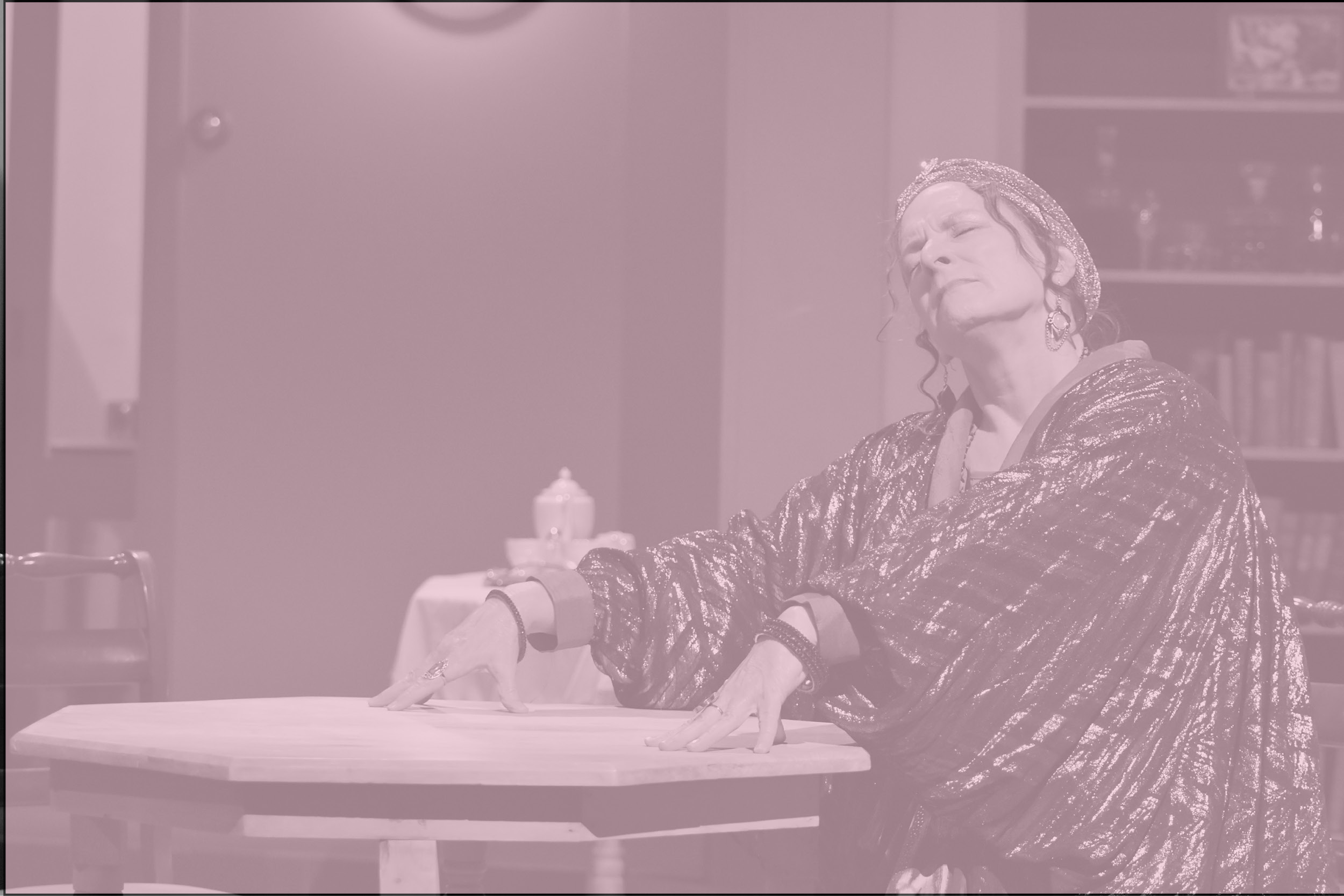 A mystic conducts a seance.